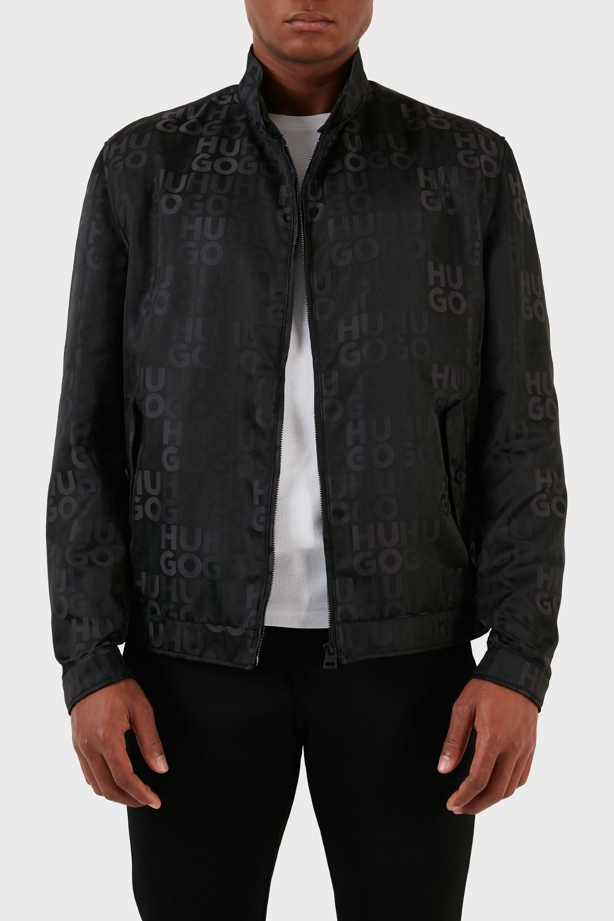 Hugo Boss Ukase 2341 water-repellent bomber Jacket in Black with an all-over tonal logo Jacquard Pattern
