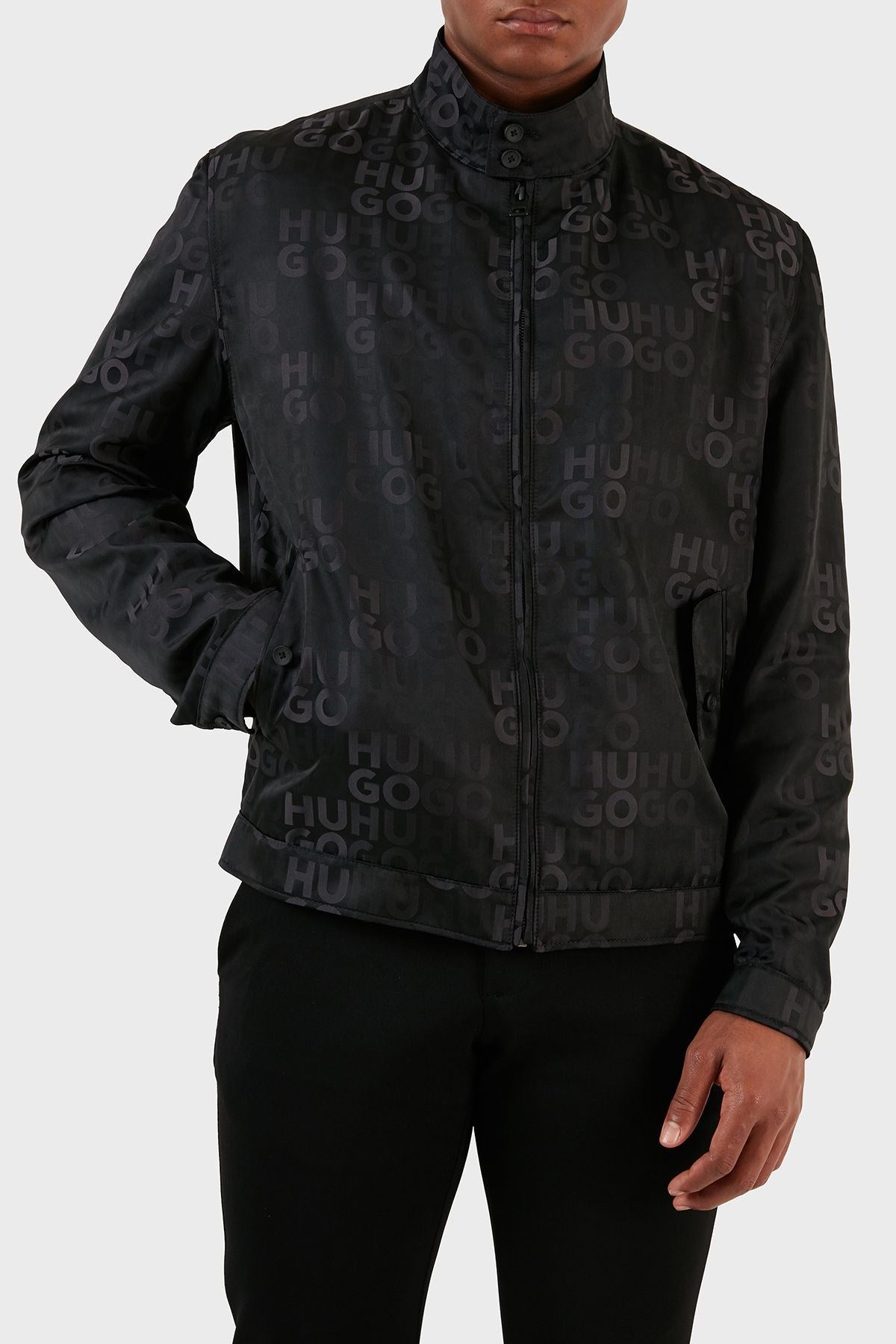 Hugo Boss Ukase 2341 water-repellent bomber Jacket in Black with an all-over tonal logo Jacquard Pattern