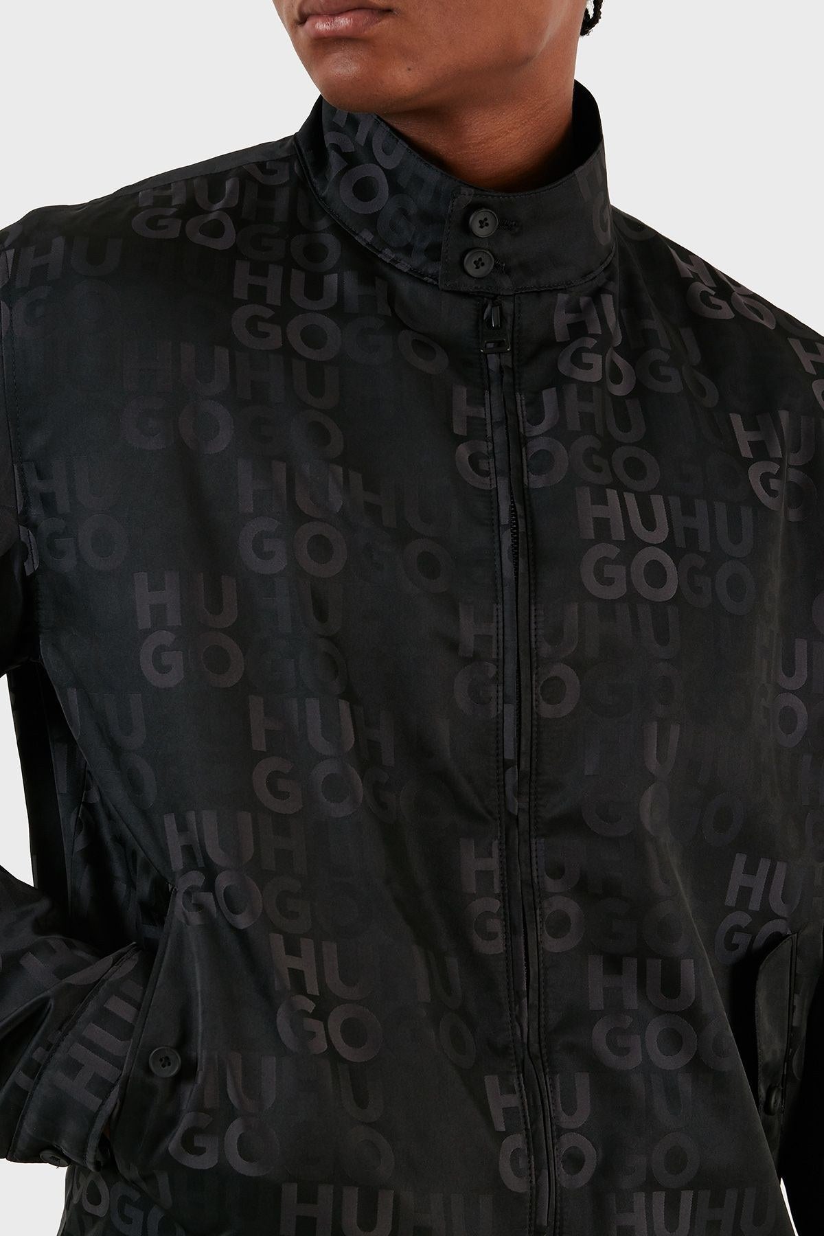 Hugo Boss Ukase 2341 water-repellent bomber Jacket in Black with an all-over tonal logo Jacquard Pattern