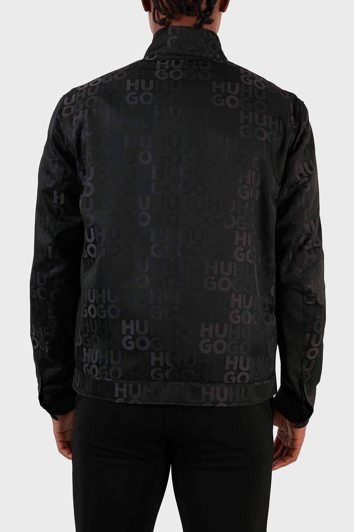 Hugo Boss Ukase 2341 water-repellent bomber Jacket in Black with an all-over tonal logo Jacquard Pattern